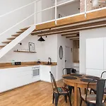 Rondo Wiatraczna Loft Apartment