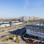 Modern Zoliborz Apartment by Renters
