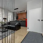 Exclusive Grey And Red Apartment In Warsaw Center By Noclegi Renters