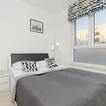 Subtle Colors Apartment In Warsaw With Furnished Balcony By Renters