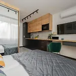 Modern Black & Wooden Apartment Warsaw Near The Airport By Noclegi Renters