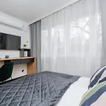 Modern Black & Wooden Apartment Warsaw Near The Airport By Noclegi Renters