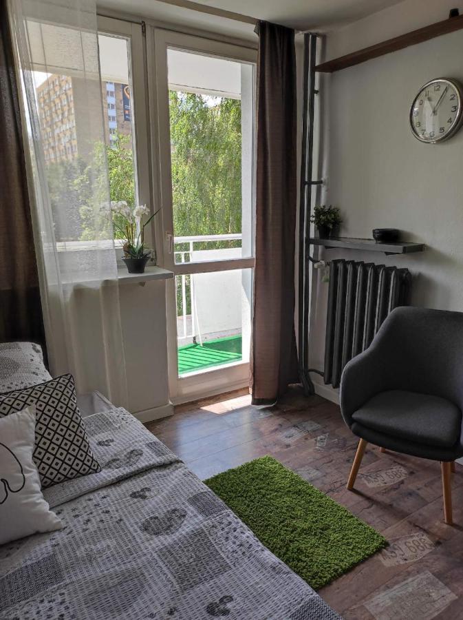 With A Balcony In The Very Center Of *