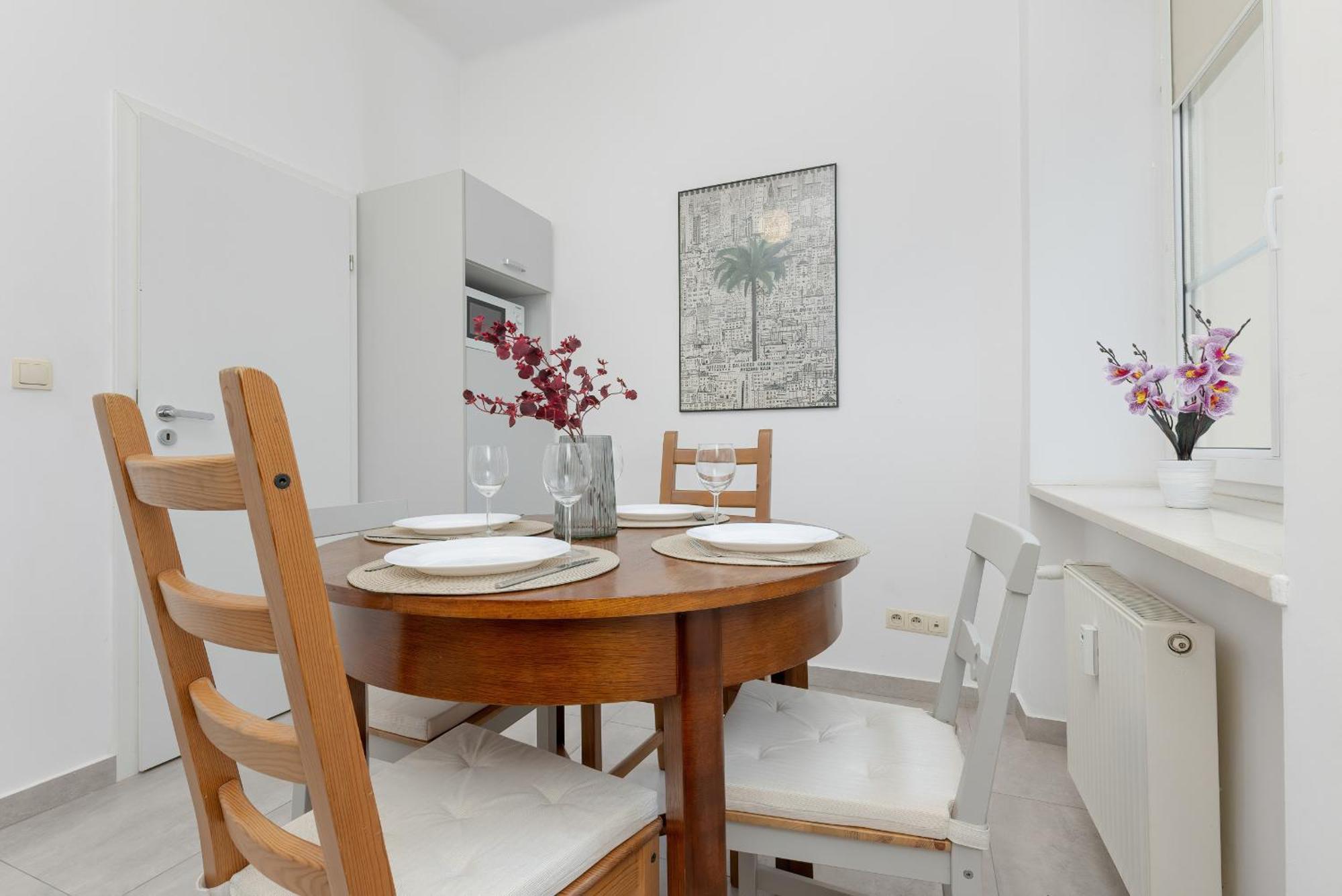 In The Center Of With Balcony And Separate Kitchen By Renters