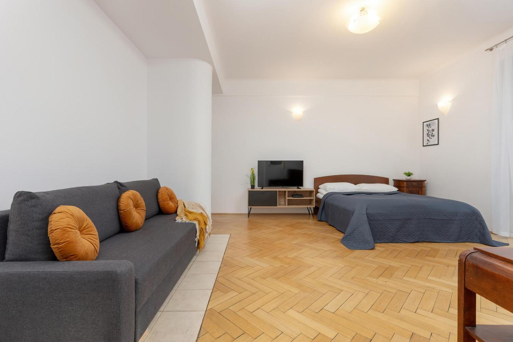 In The Center Of With Balcony And Separate Kitchen By Renters