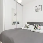 Subtle Colors Apartment In Warsaw With Furnished Balcony By Noclegi Renters