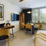 Atmospheric Studio For 3 People In Warsaw With Desk For Remote Work By Noclegi Renters