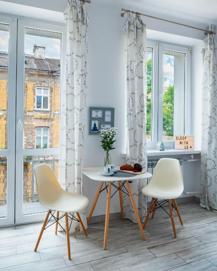 Emilii Plater 12: With Balcony Apartment Warsaw